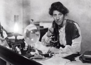 Marie Stopes, palaeobotanist, working in her laboratory, 1904. Her geological achievements and those of other women in geology feature in HOGG publications. Image credit: Marie Stopes International (with permission, in being used to further understanding about Dr Marie Stopes.)
